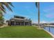 Covered patio, pool, and canal-side access at 3015 Curry Ter, Port Charlotte, FL 33981