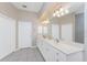 Double vanity bathroom with ample counter space and storage at 3015 Curry Ter, Port Charlotte, FL 33981