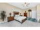 Cozy bedroom with wood furniture and access to hallway at 3015 Curry Ter, Port Charlotte, FL 33981