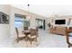 Casual breakfast nook with water views and seating for four at 3015 Curry Ter, Port Charlotte, FL 33981
