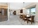 Elegant dining room with a view, hardwood floors and a chandelier at 3015 Curry Ter, Port Charlotte, FL 33981