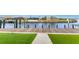 Private dock with artificial turf and walkway, offering waterfront access at 3015 Curry Ter, Port Charlotte, FL 33981