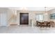 Bright and spacious entryway with double doors and a staircase at 3015 Curry Ter, Port Charlotte, FL 33981