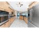 Modern kitchen with stainless steel appliances and granite countertops at 3015 Curry Ter, Port Charlotte, FL 33981