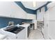 Bright laundry room with modern washer, dryer, and ample cabinetry at 3015 Curry Ter, Port Charlotte, FL 33981