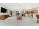 Open living area with a large TV and comfortable seating at 3015 Curry Ter, Port Charlotte, FL 33981