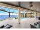 Enjoy waterfront views from this covered patio with pool access at 3015 Curry Ter, Port Charlotte, FL 33981