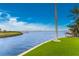 Scenic canal view with lush green landscaping at 3015 Curry Ter, Port Charlotte, FL 33981