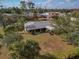 Home with a large yard, mature trees, and a serene setting at 3568 Middletown St, Port Charlotte, FL 33952