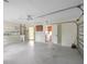 Large and clean garage space offering ample room for parking and storage, with laundry room access at 3568 Middletown St, Port Charlotte, FL 33952