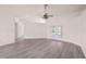 Spacious living room with hard surface flooring, neutral walls and french door access to the outdoors at 3568 Middletown St, Port Charlotte, FL 33952