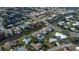 Aerial view highlighting a canal-front property with a shared pool at 365 Englewood Isles Pkwy # 3, Englewood, FL 34223