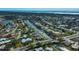 Aerial view showcasing a canal-front property in a residential community at 365 Englewood Isles Pkwy # 3, Englewood, FL 34223