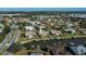 Bird's eye view of waterfront property with private docks at 365 Englewood Isles Pkwy # 3, Englewood, FL 34223