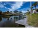 Private boat dock with walkway, offering convenient water access at 365 Englewood Isles Pkwy # 3, Englewood, FL 34223