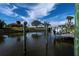 Waterfront property featuring a private boat dock at 365 Englewood Isles Pkwy # 3, Englewood, FL 34223