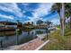 Charming brick pathway leads to a private boat dock at 365 Englewood Isles Pkwy # 3, Englewood, FL 34223