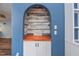 Custom built-in shelving unit with wood-look accents at 365 Englewood Isles Pkwy # 3, Englewood, FL 34223