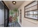Bright and inviting entryway with a tropical mural and tiled floors at 365 Englewood Isles Pkwy # 3, Englewood, FL 34223