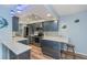 Modern kitchen with stainless steel appliances and an island at 365 Englewood Isles Pkwy # 3, Englewood, FL 34223