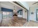 Open living space with water views and sliding glass doors at 365 Englewood Isles Pkwy # 3, Englewood, FL 34223
