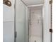 Clean shower with tiled walls and glass door at 365 Englewood Isles Pkwy # 3, Englewood, FL 34223