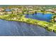 Aerial view of waterfront community and surrounding area at 4233 Grosse Pointe Dr, Port Charlotte, FL 33953