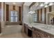Relaxing bathroom with soaking tub and double vanity at 4233 Grosse Pointe Dr, Port Charlotte, FL 33953