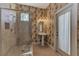 Bathroom boasts a pedestal sink and walk-in shower at 4233 Grosse Pointe Dr, Port Charlotte, FL 33953