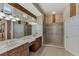 Double vanity bathroom with a large walk-in shower at 4233 Grosse Pointe Dr, Port Charlotte, FL 33953