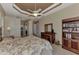 Primary bedroom with a dresser, bookcase, and ensuite bathroom at 4233 Grosse Pointe Dr, Port Charlotte, FL 33953