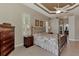 Elegant Primary bedroom with a dresser, nightstands and ensuite bathroom at 4233 Grosse Pointe Dr, Port Charlotte, FL 33953