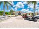 Community clubhouse with golf cart parking at 4233 Grosse Pointe Dr, Port Charlotte, FL 33953