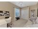 Bright home office features built-in desk and cabinet at 4233 Grosse Pointe Dr, Port Charlotte, FL 33953