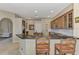 Spacious kitchen with stainless steel appliances and dark countertops at 4233 Grosse Pointe Dr, Port Charlotte, FL 33953