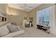 Home office with comfortable sofa and work space at 4233 Grosse Pointe Dr, Port Charlotte, FL 33953