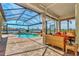 Relaxing screened-in pool and patio area at 4233 Grosse Pointe Dr, Port Charlotte, FL 33953