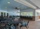 Community pool area with covered seating and bar at 4233 Grosse Pointe Dr, Port Charlotte, FL 33953