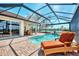 Inviting pool area with lounge chair and water view at 4233 Grosse Pointe Dr, Port Charlotte, FL 33953