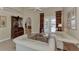 Spacious sitting area with French doors leading to a relaxing pool view at 4233 Grosse Pointe Dr, Port Charlotte, FL 33953