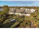 Condo building with screened lanai and backyard at 4260 Placida Rd # 12C, Englewood, FL 34224