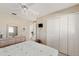 Spacious bedroom with a queen bed and built-in wardrobe at 4260 Placida Rd # 12C, Englewood, FL 34224