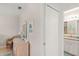 Bedroom with dresser and access to a shared bathroom at 4260 Placida Rd # 12C, Englewood, FL 34224