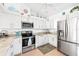 Bright kitchen featuring stainless steel appliances at 4260 Placida Rd # 12C, Englewood, FL 34224