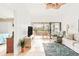 Living area features a comfy sofa, recliner, and access to a balcony at 4260 Placida Rd # 12C, Englewood, FL 34224