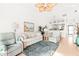 Spacious living room with ample seating and access to a balcony at 4260 Placida Rd # 12C, Englewood, FL 34224