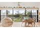 Spacious screened balcony overlooking lush greenery at 4260 Placida Rd # 12C, Englewood, FL 34224