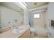 Clean bathroom with tub, sink, and vanity at 4490 Gillot Blvd, Port Charlotte, FL 33981