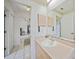 Bathroom with vanity and view of living room at 4490 Gillot Blvd, Port Charlotte, FL 33981