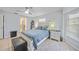 Comfortable bedroom with ensuite bathroom access at 4490 Gillot Blvd, Port Charlotte, FL 33981